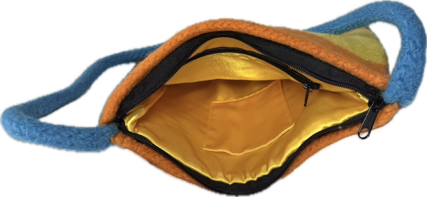 interior view showing gold lining and pockets